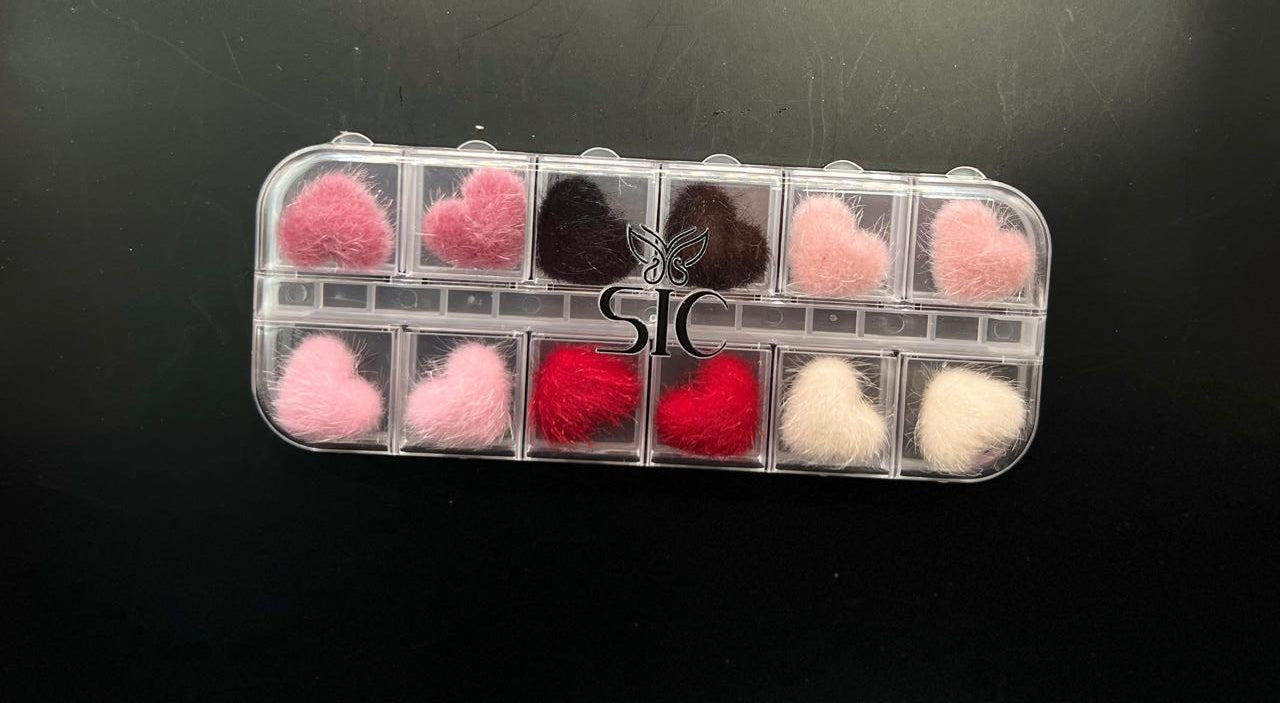 Pompón de corazón con imán